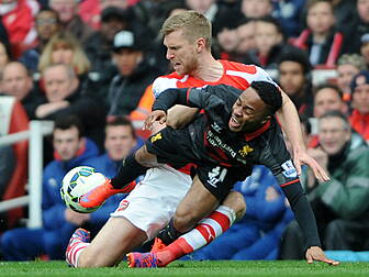 Gunners close the gap with sor...